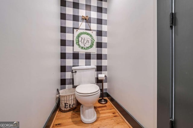 4770 Hilltop Dr NW, Acworth, GA 30101 - bathroom with toilet and wood finished floors