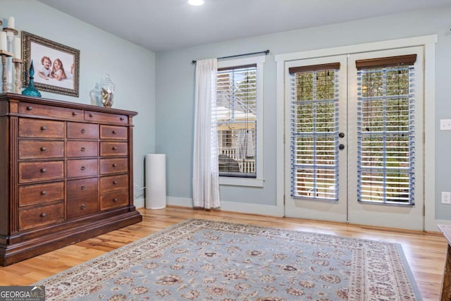 4770 Hilltop Dr NW, Acworth, GA 30101 - entryway featuring light wood-style flooring, recessed lighting, and french doors