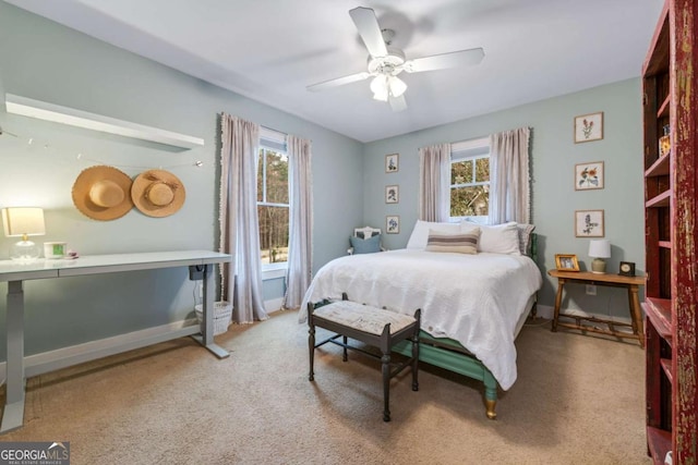 4770 Hilltop Dr NW, Acworth, GA 30101 - carpeted bedroom with a ceiling fan and baseboards