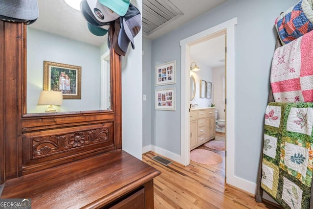 4770 Hilltop Dr NW, Acworth, GA 30101 - corridor with light wood-type flooring and baseboards
