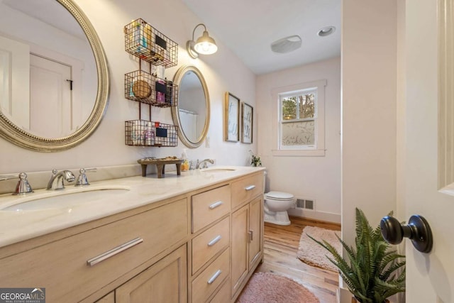 4770 Hilltop Dr NW, Acworth, GA 30101 - bathroom featuring double vanity and wood finished floors