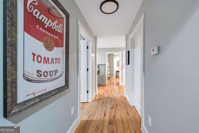 4770 Hilltop Dr NW, Acworth, GA 30101 - corridor featuring wood finished floors and baseboards