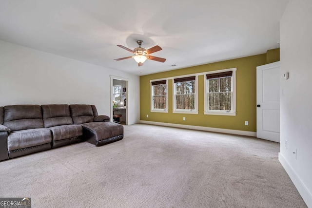 4770 Hilltop Dr NW, Acworth, GA 30101 - carpeted living room with a ceiling fan and baseboards