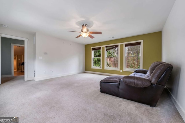 4770 Hilltop Dr NW, Acworth, GA 30101 - sitting room with a ceiling fan and carpet flooring