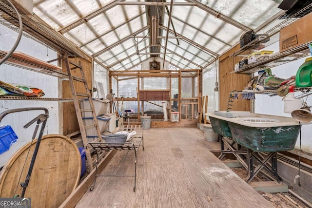 4770 Hilltop Dr NW, Acworth, GA 30101 - miscellaneous room featuring vaulted ceiling and wood finished floors
