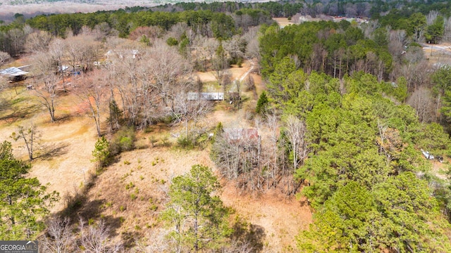 drone / aerial view with a forest view