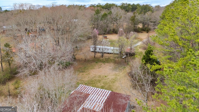 aerial view with a wooded view