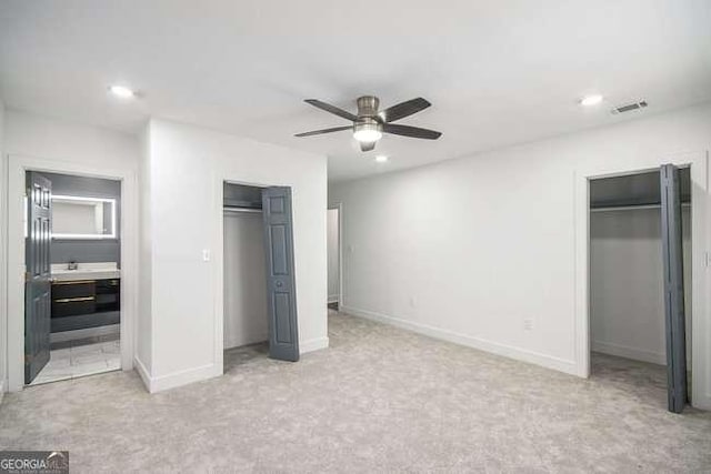 unfurnished bedroom with visible vents, recessed lighting, baseboards, and carpet floors