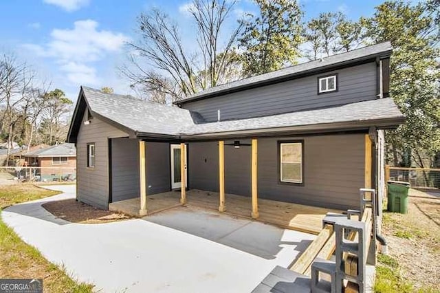 exterior space with a patio and fence