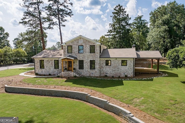 160 Tillman Ln, Athens, GA 30606 - view of front of property featuring a front yard, brick siding, and a chimney