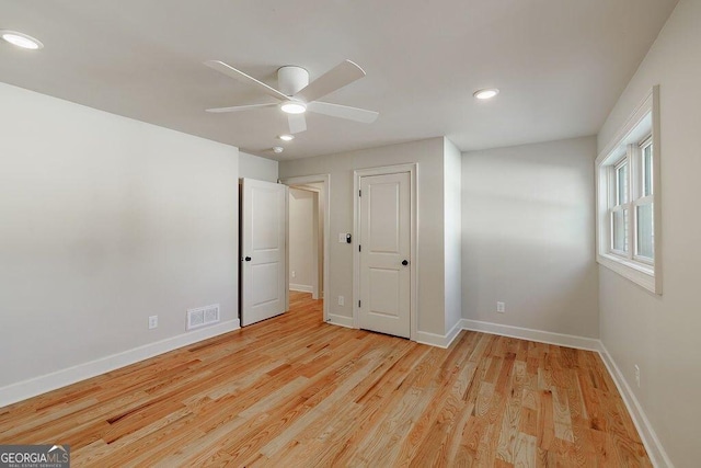 unfurnished bedroom with visible vents, baseboards, recessed lighting, ceiling fan, and light wood-type flooring