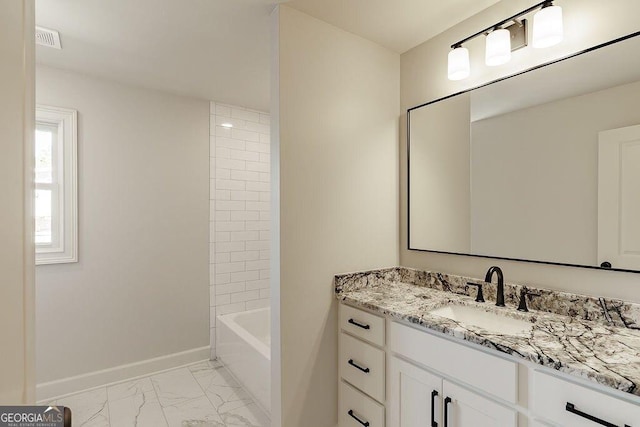 full bathroom featuring vanity, visible vents, baseboards, and marble finish floor