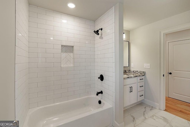 full bathroom featuring vanity, baseboards, recessed lighting, bathing tub / shower combination, and marble finish floor