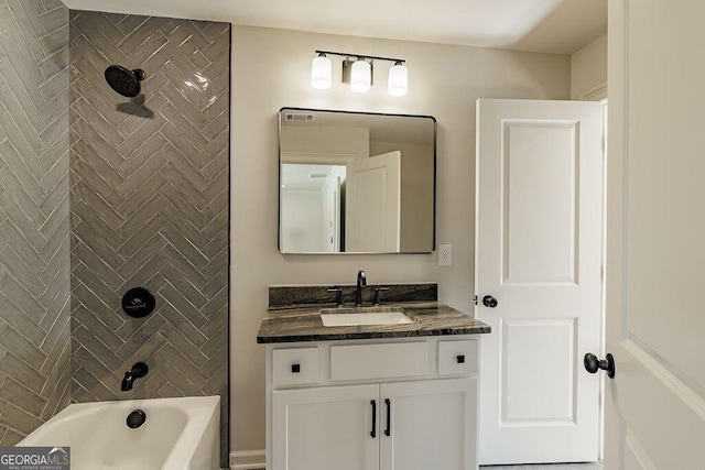 full bath featuring vanity and shower / bathing tub combination