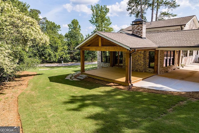 160 Tillman Ln, Athens, GA 30606 - view of grassy yard with a wooden deck and a patio