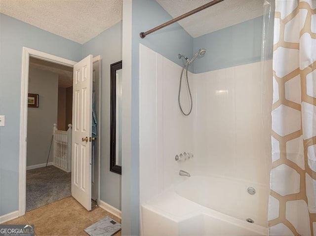 full bath with baseboards, a textured ceiling, tile patterned flooring, and shower / bath combination with curtain