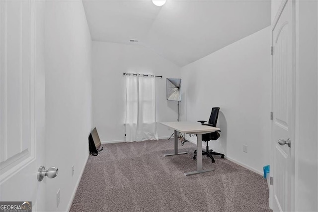 home office with lofted ceiling, carpet, and baseboards