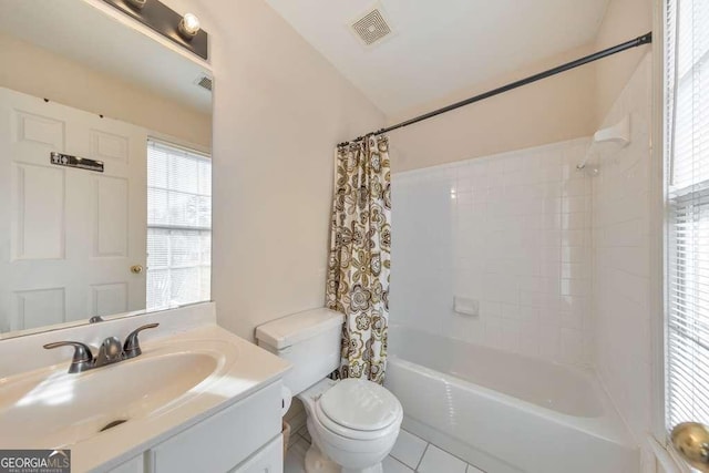 full bath featuring visible vents, shower / tub combo, toilet, and vanity