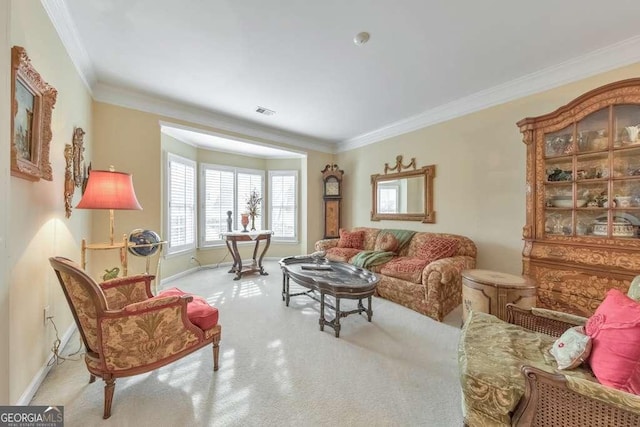 carpeted living area featuring visible vents, crown molding, and baseboards
