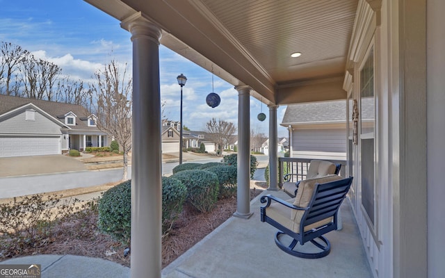 view of patio with a residential view and covered porch