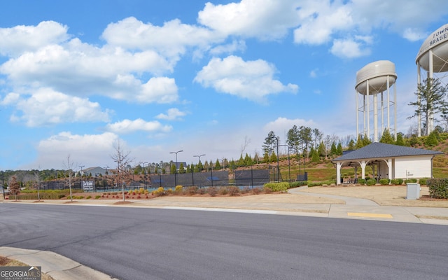 view of road with curbs and sidewalks