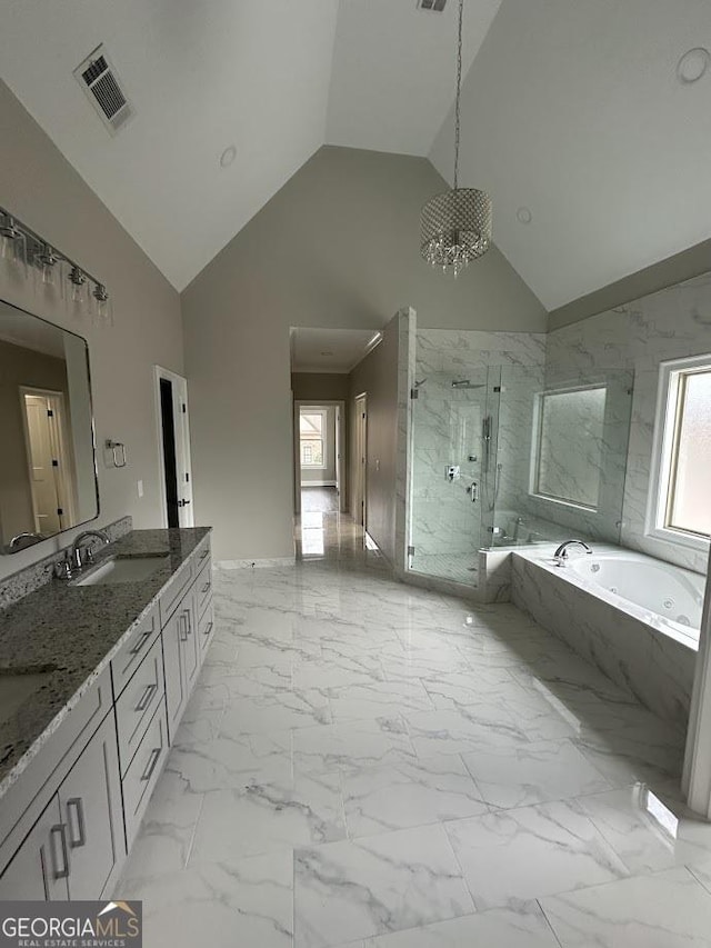 bathroom with vanity, visible vents, a marble finish shower, a garden tub, and marble finish floor