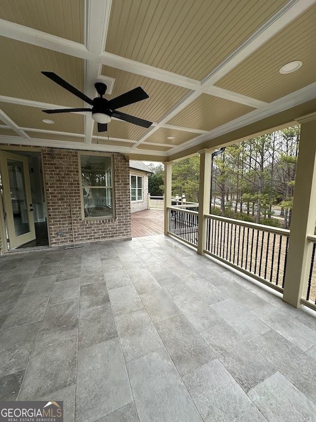 view of patio featuring ceiling fan