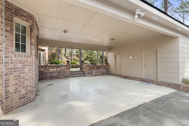 view of patio featuring a carport