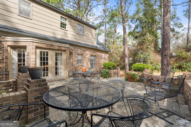 view of patio / terrace with french doors and outdoor dining area