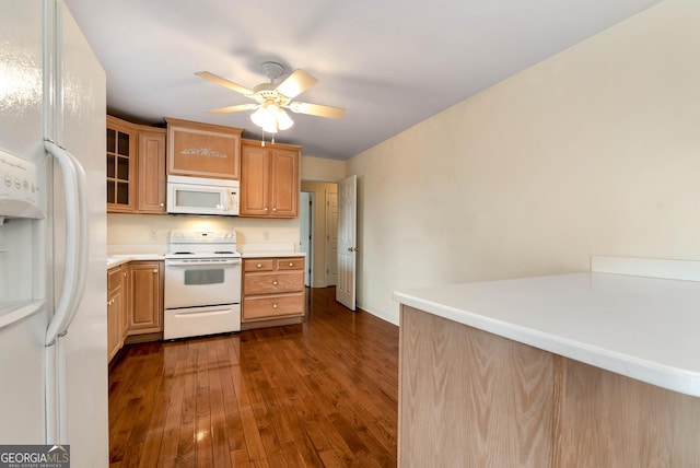 kitchen featuring glass insert cabinets, light countertops, dark wood-style floors, white appliances, and a ceiling fan