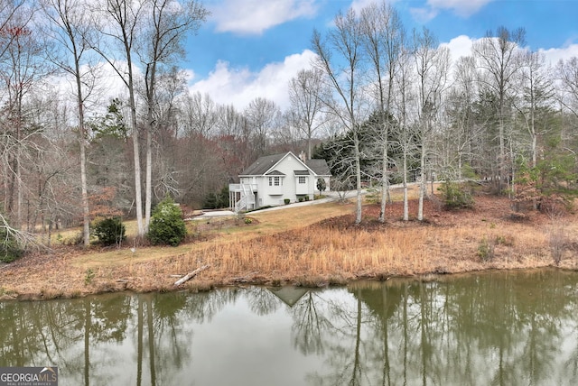 rear view of house with a water view