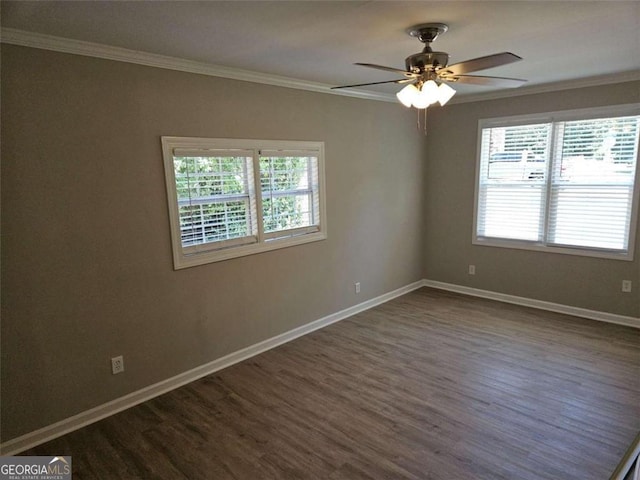 147 Mildred Ct, Dallas, GA 30157 - spare room featuring plenty of natural light, dark wood-type flooring, ornamental molding, and ceiling fan
