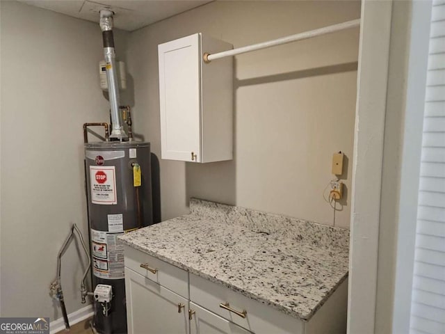 147 Mildred Ct, Dallas, GA 30157 - utility room with gas water heater