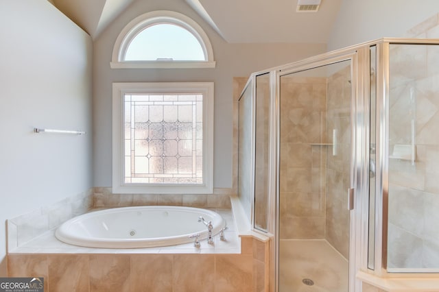 full bathroom featuring visible vents, a stall shower, a whirlpool tub, and vaulted ceiling