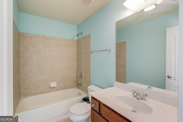 bathroom featuring visible vents, vanity, toilet, and shower / bathtub combination