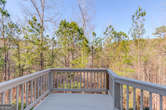 deck with a wooded view