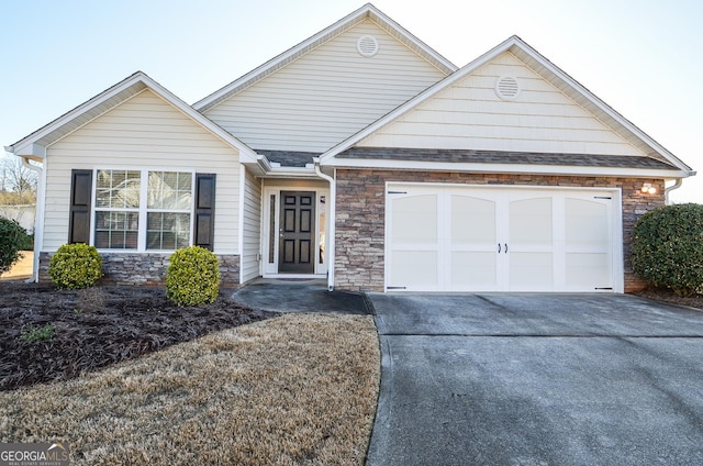 single story home with stone siding, roof with shingles, concrete driveway, and an attached garage