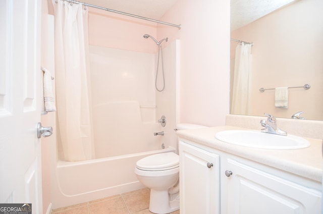 full bath with tile patterned flooring, toilet, vanity, a textured ceiling, and shower / bathtub combination with curtain