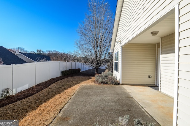 exterior space featuring a fenced backyard and a patio area