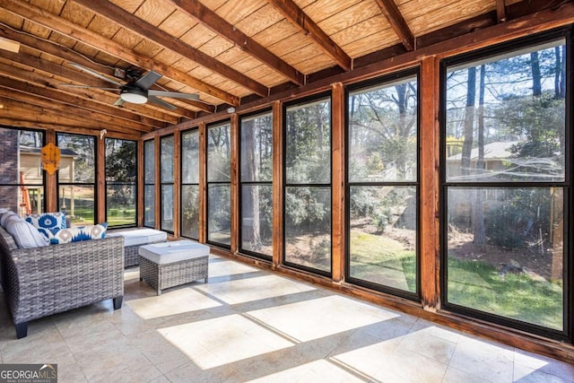 sunroom with wooden ceiling and a ceiling fan