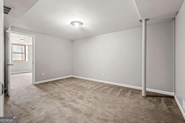 unfurnished bedroom with visible vents, baseboards, and carpet floors