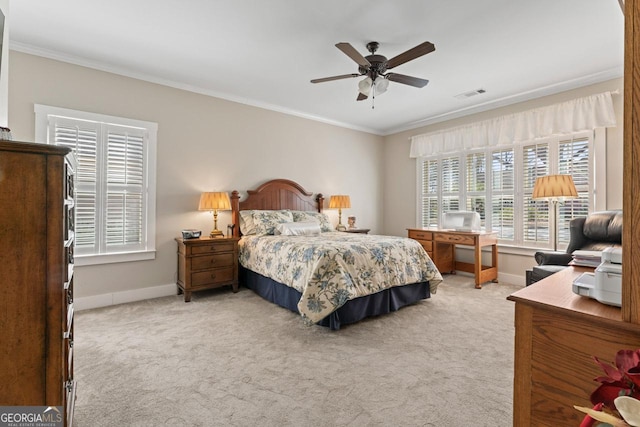 bedroom featuring visible vents, baseboards, light colored carpet, and ornamental molding