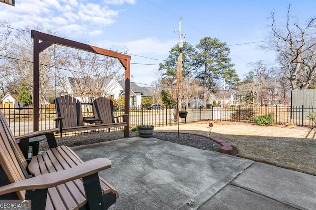 view of patio / terrace featuring fence