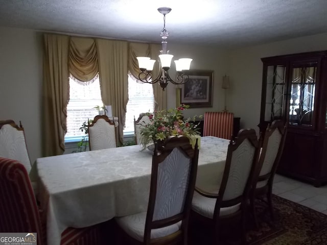 dining room featuring a notable chandelier