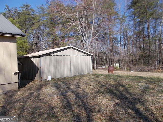 exterior space with an outbuilding