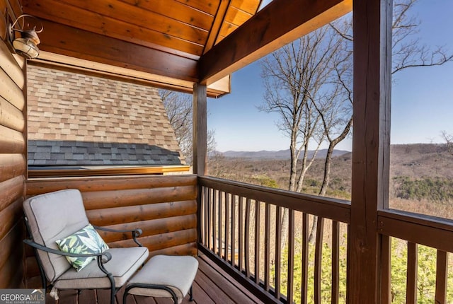 wooden terrace with a mountain view