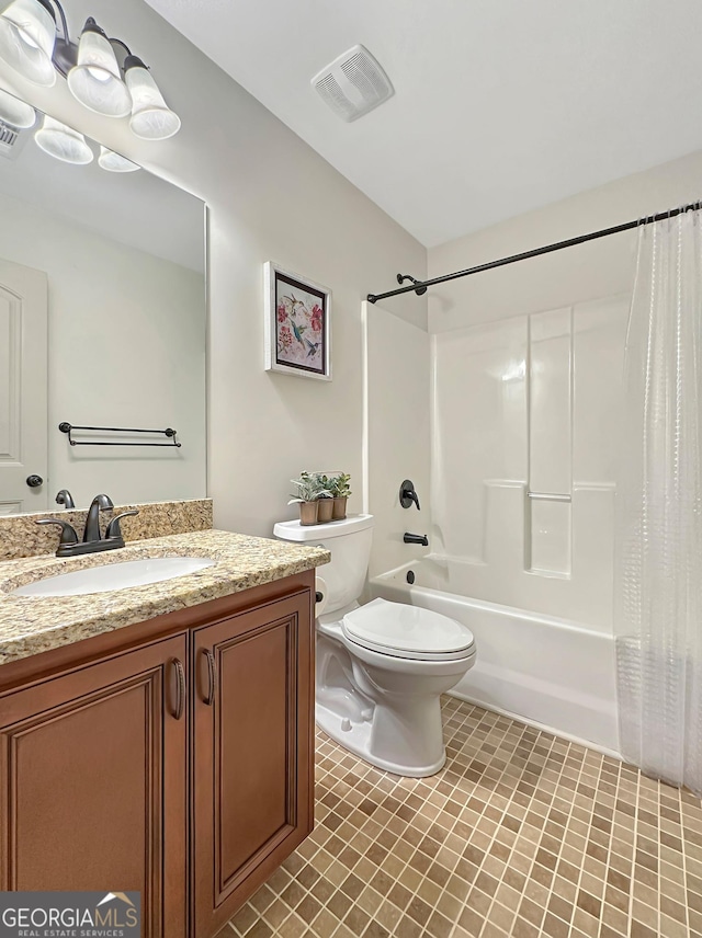 bathroom featuring visible vents, toilet, vanity, and shower / tub combo with curtain