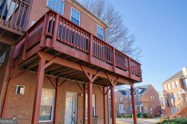 exterior space with brick siding