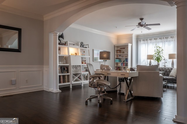 interior space featuring visible vents, hardwood / wood-style flooring, arched walkways, ceiling fan, and ornate columns