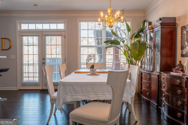 dining area with baseboards, dark wood-style flooring, french doors, crown molding, and a notable chandelier